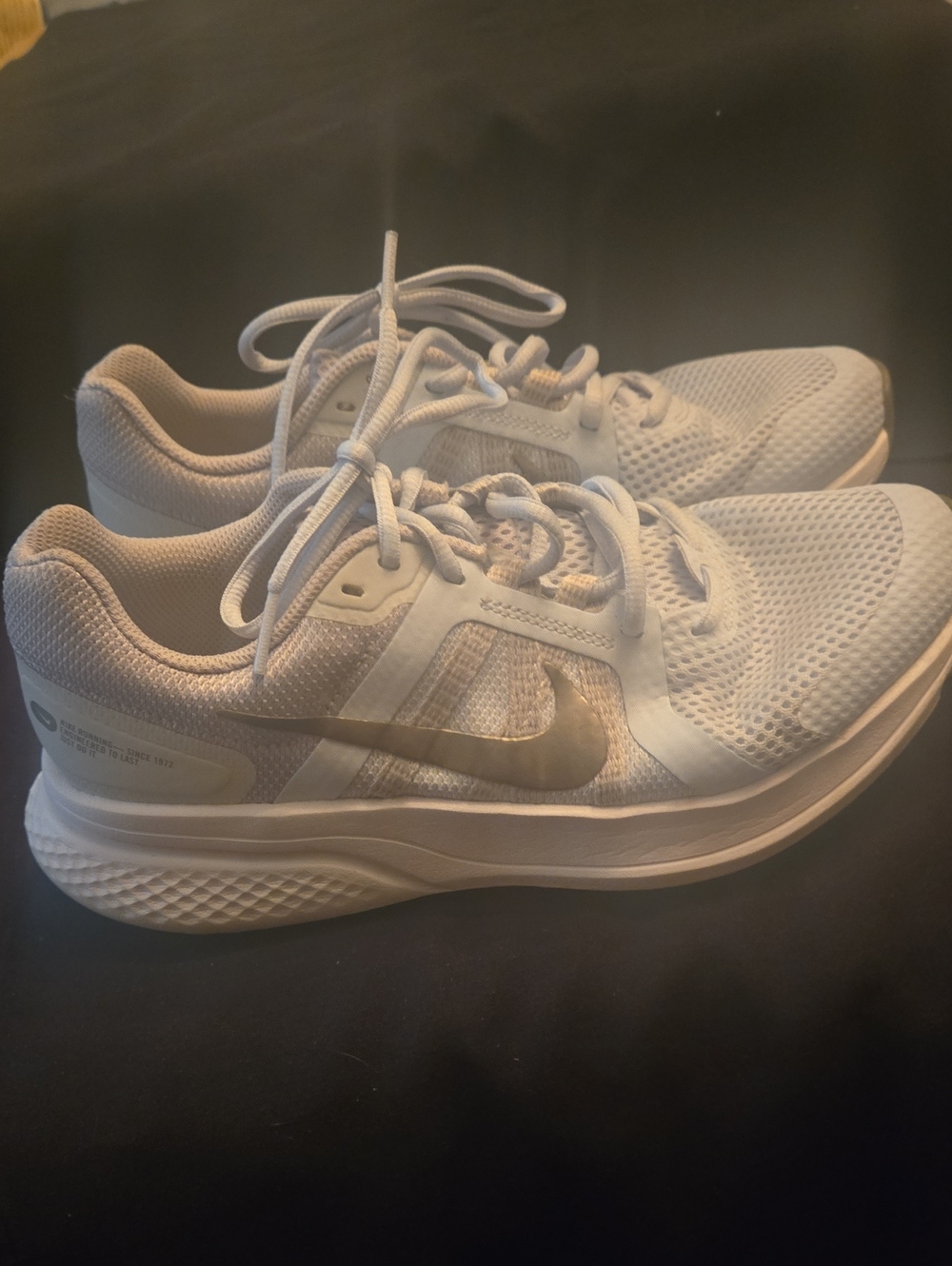 Nike Women’s White Sneakers with Light Gold Swoosh